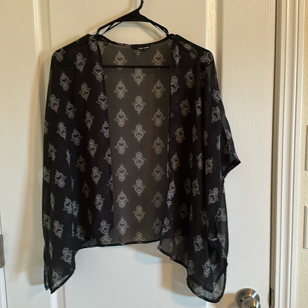 Functional Tunic. You can wear it on top of everything. Like crop top or bikini